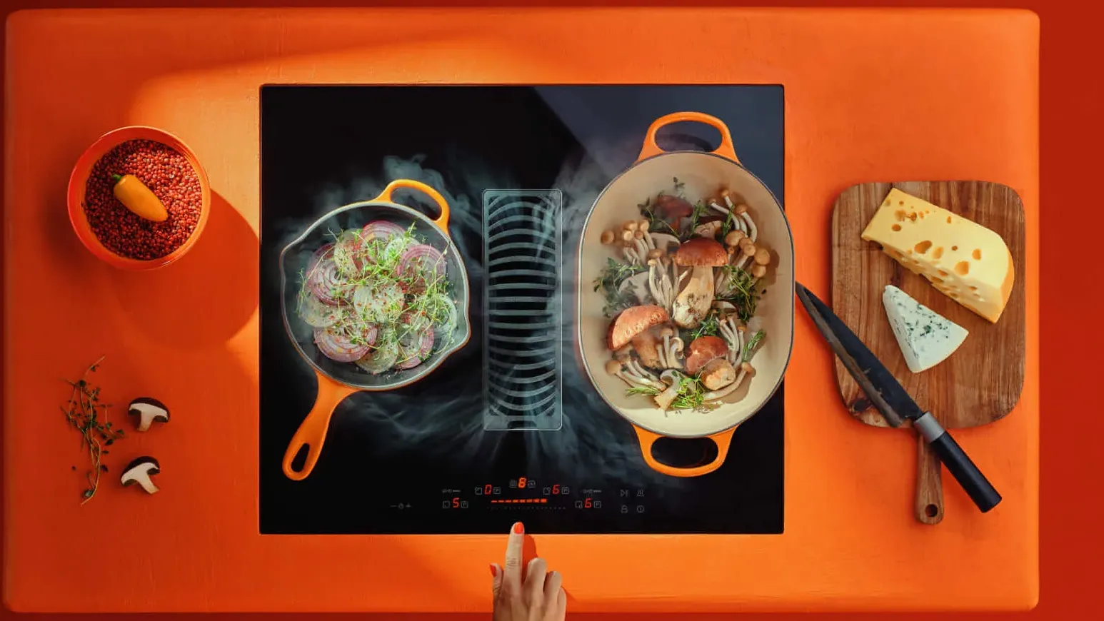 Hoods integrated in the cooktop