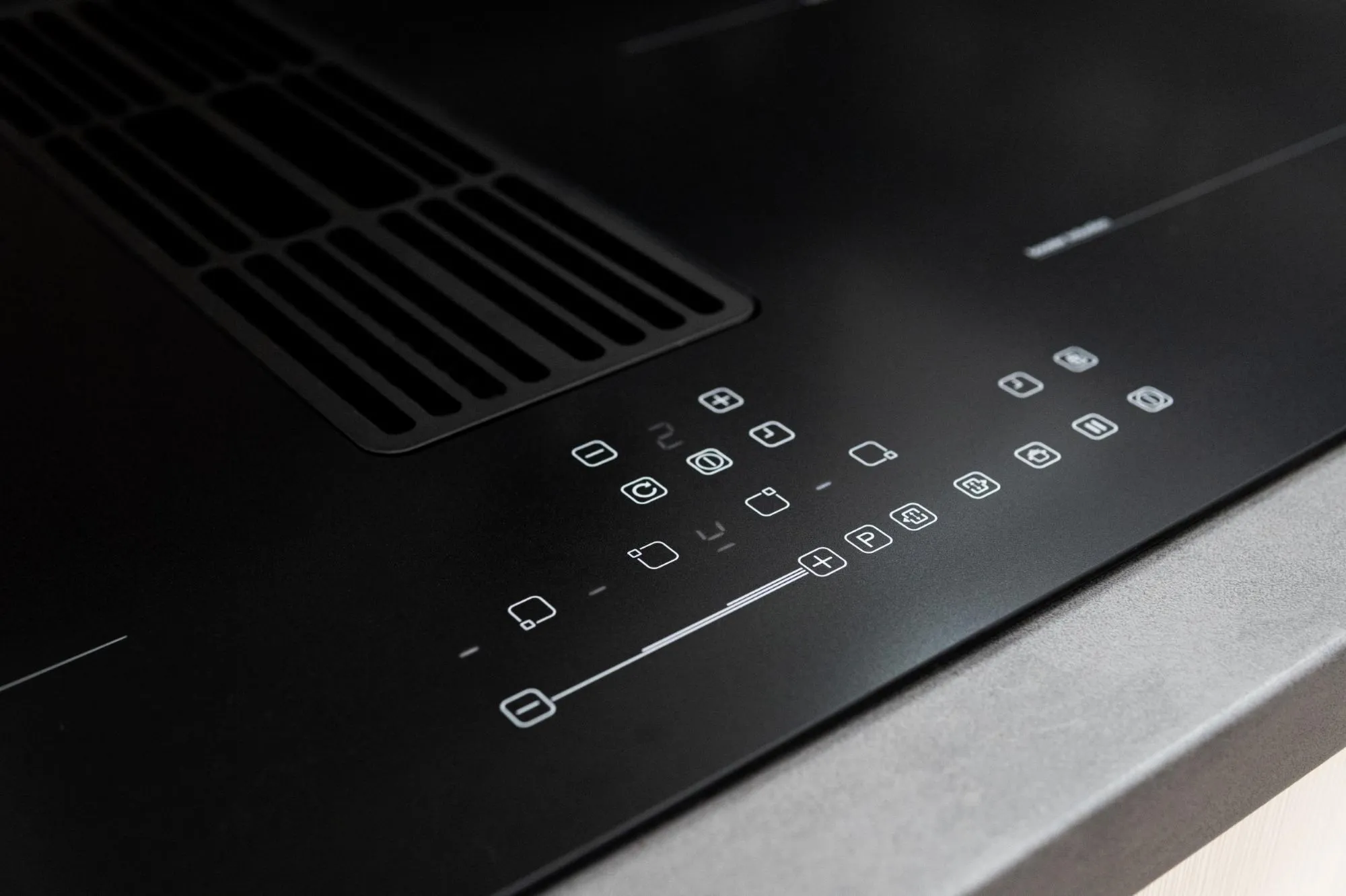 Image Induction hob with integrated extractor hood KHI8000B